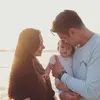 Potret gemas Baby Chloe main ke pantai pertama kali.