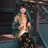Ghea Indrawari Jadi Gadis Dayak