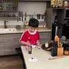Anak-anak Chef Devina Hermawan ikut memasak