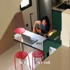 Sheryl Sheinafia sedang beraktivitas di dapur