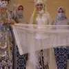 Potret detik-detik Lesti menuju altar akad nikah.