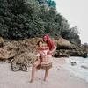 Xarena anak Sibad Krisjiana Main di pantai