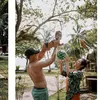 Xarena anak Sibad Krisjiana Main di pantai