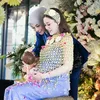 Atta Halilintar dan Aurel Hermansyah di acara mitoni Aaliyah Massaid 