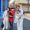 Kevin Aprilio dan keluarga berpose bersama karakter film Incredibles