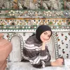 Potret OOTD Citra Kirana liburan di Thailand