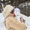 Reino Barack Gendong Baby R