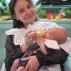 rossa momong anak seleb