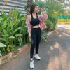 Potret Clairine Clay kenakan crop top.