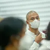 Prosesi tutup peti dan kremasi Reza Gunawan