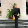 Potret Syahrini Nonton Konser Cakra Khan di Singapura