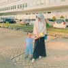 Potret Larissa momong anaknya.