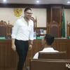 ammar tersenyum zoni saat sidang