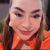 Anisa Bahar pakai baju orange