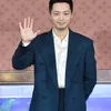 Byun Yohan melambaikan tangan saat difoto