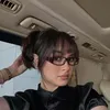 Caitlin Halderman tampil berponi