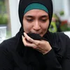 Dhini Aminarti berhijab