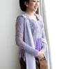Aya Hutami pakai kebaya lilac