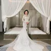 Jennifer Coppen Pakai Kebaya Putih