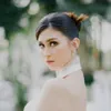 Celia Thomas Teuku Ryan