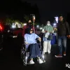 Doktif duduk di kursi roda