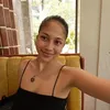 Sitha Marino duduk di sofa kuning