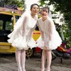 Duo Anggrek pakai dress putih
