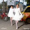Duo Anggrek pakai baju pengantin