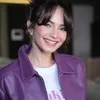 Enzy Storia tersenyum