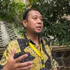 Pengacara Andre Taulany pakai batik