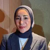 Erin Wartia Pakai Hijab Hitam