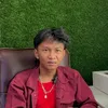 Fajar Sadboy pakai jaket merah