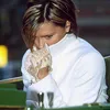 Victoria Beckham Sembunyikan Mulutnya