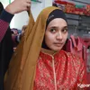 Dhini Aminarti