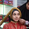 Dhini Aminarti