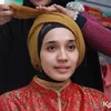 Dhini Aminarti