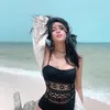 Millendaru Pakai Baju Renang