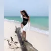 Millendaru Pakai Baju Renang