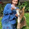 Foto Susi Pudjiasti Bersama Rusa