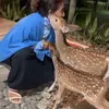 Foto Susi Pudjiasti Bersama Rusa