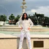 Gerald Situmorang berdiri di depan tugu