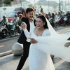 Boiyen dan Rully prewedding di tepi jalan