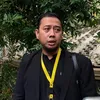 Pengacara Andre Taulany pakai baju hitam