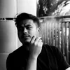 Rully Anggi Akbar pakai kaos