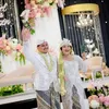 Rully Anggi Akbar ketika menikah dengan Boiyen