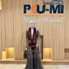 Imel Putri Cahyati berpose di depan area PKU-MI