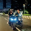 Flavio Zaviera motoran di malam hari