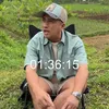 Irfan Hakim duduk di tengah kebun