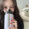 Tiffany Young SNSD Pegang Tumbler