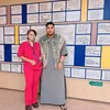 Ivan Gunawan bareng wanita berbaju merah